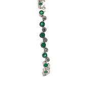 Emerald and Diamond Tennis Bracelet set in 18K White Gold, 7"