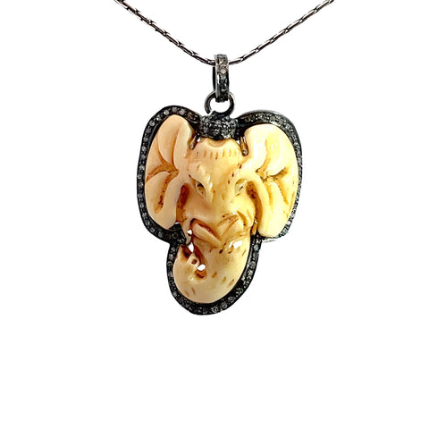 Pendant in bone, set in Sterling Silver, with Diamonds & Sterling Silver Chain, 18"