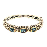 Bangle Bracelet in Sterling Silver and 14K Yellow Gold with Blue Topaz, 8.5"